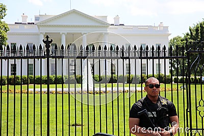 U.S. Secret Service Officer in front of White House. Washington DC Editorial Stock Photo