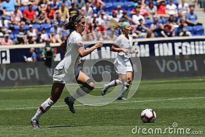 U.S. Women`s National Soccer Team captain Alex Morgan #13 in action during friendly game against Mexico Editorial Stock Photo