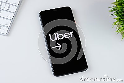 Uber Driver s app logo on a smartphone screen Editorial Stock Photo