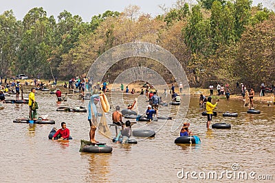 Ubon Ratchathani, Thailand - March 20, 2020 : Many Thai people casting a net for catching fish at river. Fishermen show ancient Editorial Stock Photo