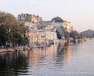 Udaipur`s City Palace from Lake Pichola Stock Photo