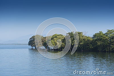 Udawalawe, Sri Lanka dramatic view across a lake Stock Photo
