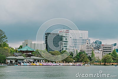 Ueno, Japan, April 7, 2023 : Swan paddle boats for rent at Shinobazu Pond in Ueno Park during cherry blossom season Editorial Stock Photo