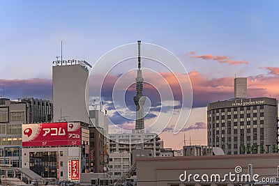 Sunset view of the skytree tower overlooking the skyscrapers of the Ueno district Editorial Stock Photo
