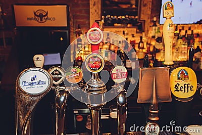 Ufa, Russia, 15 June, 2020: branded beer dispenser at the bar. Editorial Stock Photo