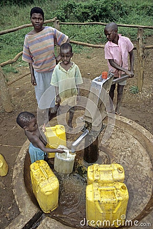 Ugandan Children fetch water at water pump Editorial Stock Photo