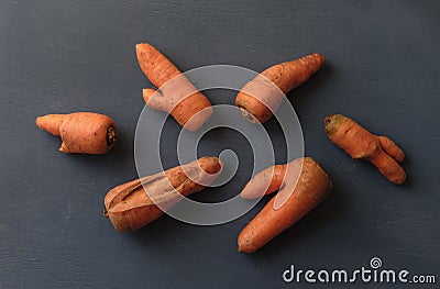 Ugly carrots with unusual shapes Stock Photo