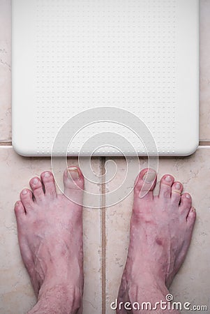 Ugly feet and scale Stock Photo