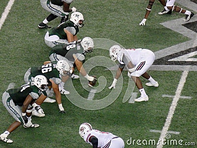 UH Football and UMassachusetts Minutemen players line up for hike Editorial Stock Photo