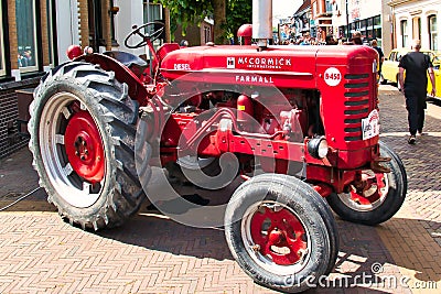 Vintage red McCormick International Farmall B450 tractor Editorial Stock Photo