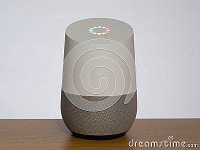 UK, April 2020: Google home smart voice assistant in studio setting Editorial Stock Photo