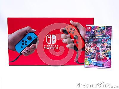 UK, Jan 2020: Nintendo switch games console box with mario kart game bundle white background Editorial Stock Photo