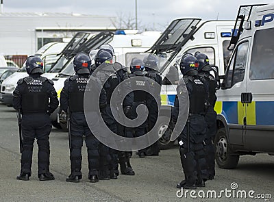 Uk Police Officers in Riot Gear Stock Photo