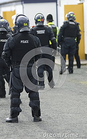 Uk Police Officers in Riot Gear Stock Photo