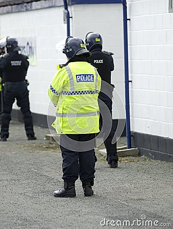 Uk Police Officers in Riot Gear Stock Photo