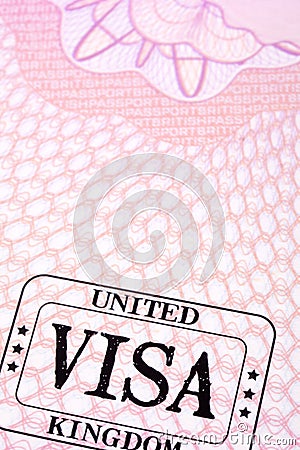 UK visa document immigration stamp passport page close up, copy space, vertical Stock Photo