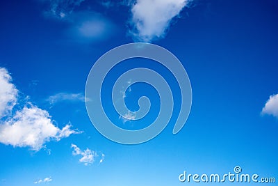 Deep Blue Skies & fluffy clouds Stock Photo