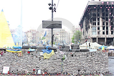 UKRAINE - APR 20, 2014: Downtown of Kiev. Burned house unions and burnt signboard Khreschatyk Street. Riot in Kiev and Weste Editorial Stock Photo