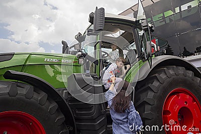 Ukraine, Kiev - June 10, 2016: Visitors near the exhibits International agro-industrial exhibition Editorial Stock Photo