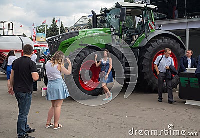 Ukraine, Kiev - June 10, 2016: Visitors near the exhibits International agro-industrial exhibition Editorial Stock Photo