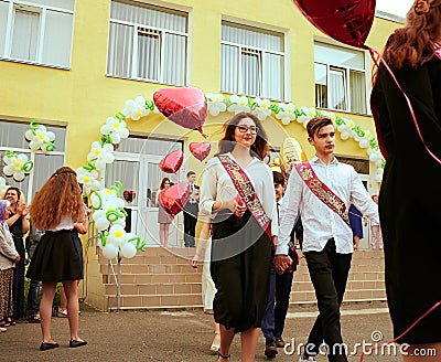 Ukraine Kiev May 2019. Graduation class go to the line in the open school yard, at the last bell festival for parents Editorial Stock Photo