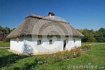 Ukraine. Kiev. White clay house with a thatch Stock Photo