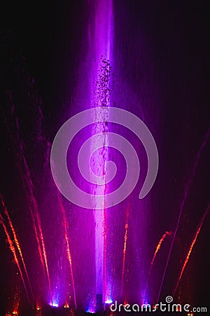 Ukraine. Kyiv - 05.06.2019 Amazing dancing fountain in the night illumination of rainbow color with colorful illuminations on the Editorial Stock Photo