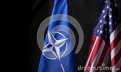 Ukraine, Kyiv - 10.04.2023. Official Flags of the US and NATO, symbols of Freedom, Patriotism, and Alliance. Two flags Editorial Stock Photo