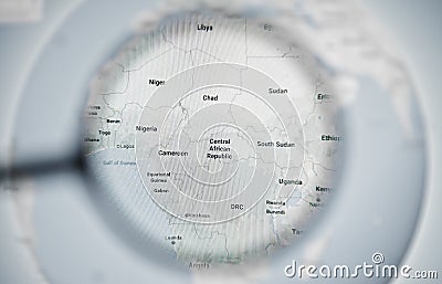 UKRAINE, ODESSA - APRIL 25, 2019: Google maps planet earth globe through magnifying glass. Editorial Stock Photo