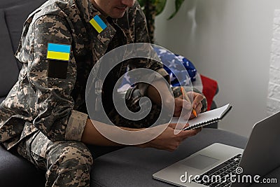 Ukraine patch flag on army uniform. Ukraine military uniform. Ukrainian troops Stock Photo