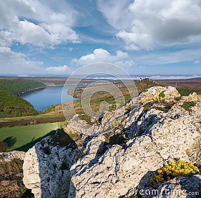 Ukraine without russian aggression. Amazing spring view on the Dnister River Canyon with picturesque rocks, fields, flowers. This Stock Photo