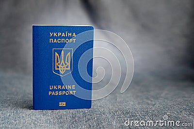 Ukrainian biometric passport on a gray background Stock Photo