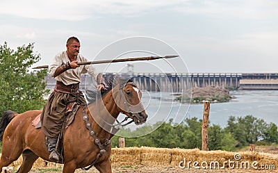 Ukrainian Cossack in Zaporozhian Sich. Khortytsia island, Ukraine Editorial Stock Photo