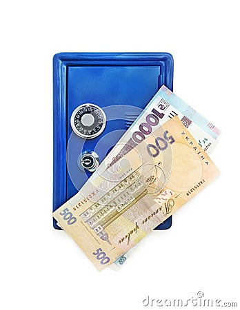 Ukrainian currency hryvnia, paper banknotes in blue safe. Stock Photo
