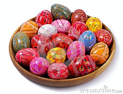 Ukrainian Easter Colorful Eggs in a wooden plate Stock Photo