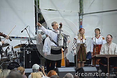 Ukrainian famous musician Oleg Skrypka performing on stage on the Andreevsky descent Editorial Stock Photo