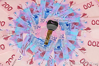 Ukrainian hryvnia, a bill of 200 hryvnia with a key from the apartment where the money is Stock Photo