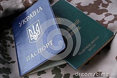 Ukrainian military ID and national passport on military uniform Stock Photo