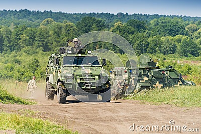 Ukrainian military vehicle KrAZ Spartan with comandos attack sim Editorial Stock Photo