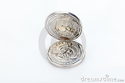 Ukrainian money. Five grivna hryvnia new coins isolated on white. Money of Ukraine. Ukrainian national currency. close-up Stock Photo