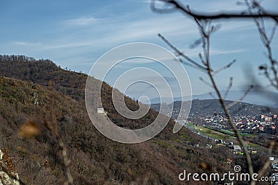 Ukrainian mountains. Lonely house in the forest and clay rock Stock Photo