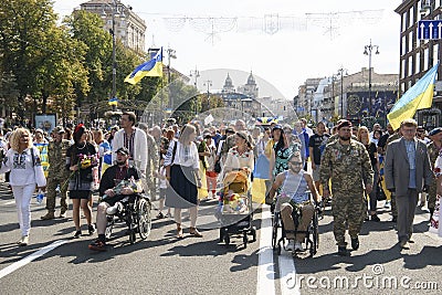 Veterans, volunteers and relatives of soldiers, killed on war on Eastern Ukraine during march on Independence Day, Kyiv Editorial Stock Photo