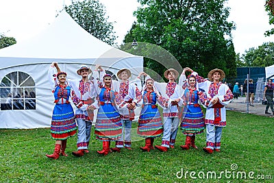 Ukrainian youth people in national costumes take part in the Montreal Ukrainian Festival. Artistic groups of dancers from Ukraine Editorial Stock Photo