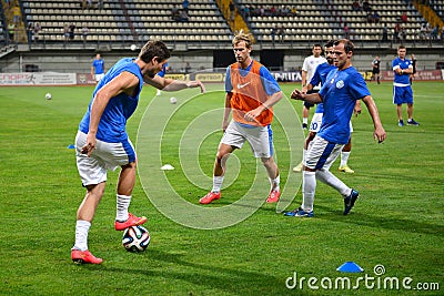 ukrainnian football players are warming up photo was taken during the match between ukraine and slovakia at nsk olimpiyskyi Editorial Stock Photo