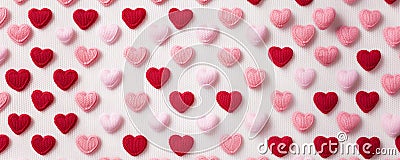 Ultra wide pattern small white pink red knitting in heart shape. Stock Photo