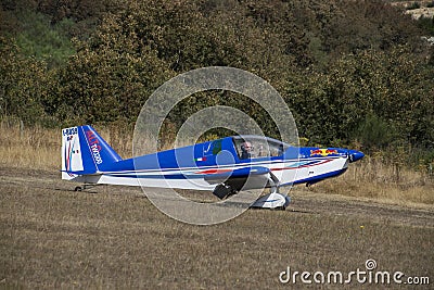 Ultralight plane flying in an airfield Editorial Stock Photo