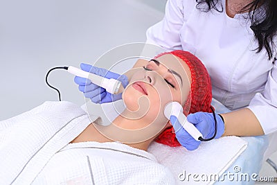 Ultrasound cavitation anti-aging, lifting procedure. Stock Photo