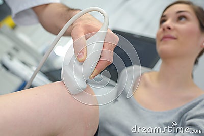 Ultrasound echo on knee woman Stock Photo