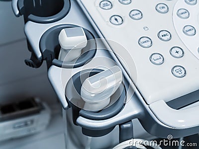 Ultrasound machine with buttons and sensors. Modern medical equipment. Details. Close-up Stock Photo