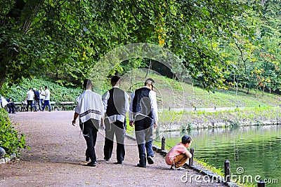 Uman, Ukraine 11.09 2018. A group of boys, Hasidic Jews, walks in Uman park, the Jewish New Year, religious Orthodox Jew Editorial Stock Photo